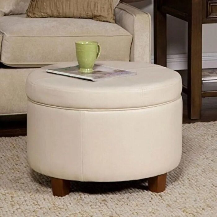 Elegant Ivory Leatherette Round Storage Ottoman - Image 1