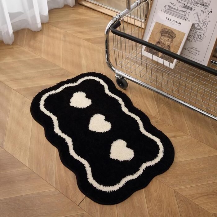 Chic Black & White Heart-Shaped Tufted Rug - Image 1